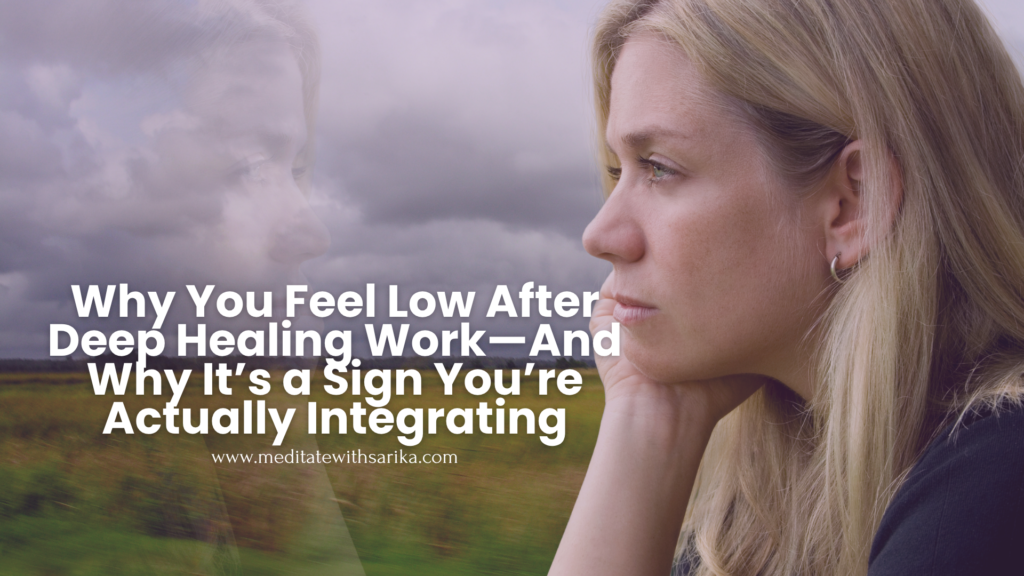 Woman gazing out window during emotional integration after energy healing and meditation sessions